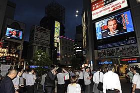 街頭ビジョンに出現したディカプリオに街行く人もビックリ「インセプション」